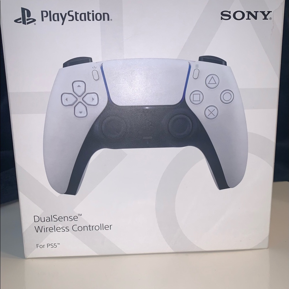 Brand new PS5 controller, never used, slightly blemished box.